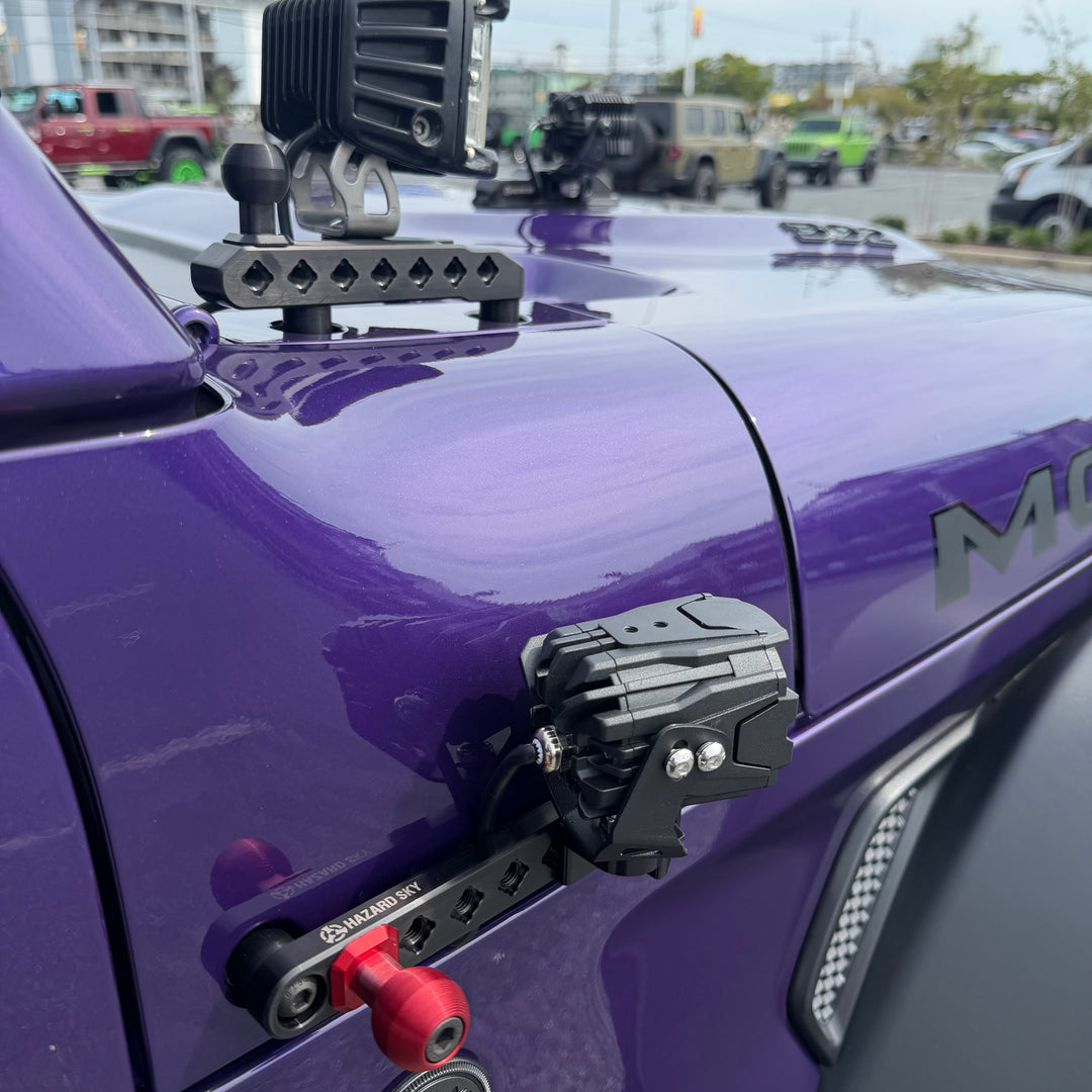Purple Jeep Wrangler JL with HazardKey cowl side rail, LED ditch light and slim light mount installed