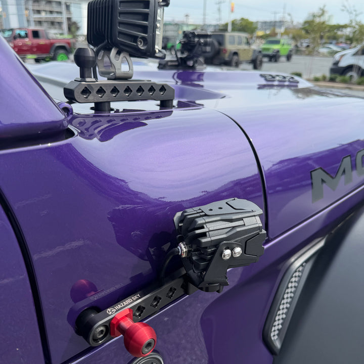 Purple Jeep Wrangler JL with HazardKey cowl side rail, LED ditch light and slim light mount installed