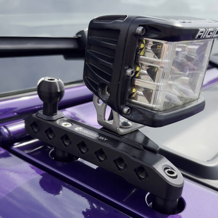 HazardKey cowl top rail on a purple Jeep Wrangler JL with an LED cube light and a 1 inch ball mount